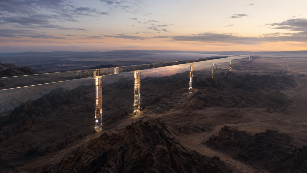 The massive, ultra-futuristic mirrored exterior wall of The Line in NEOM slicing perfectly across the sweeping, rugged red desert canyons of northwestern Saudi Arabia.